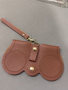 Sunglasses Cover Hanging On Handbag