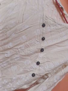 One Time Used Cream Embroidered Kurti