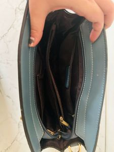Stylish Cara Handbag with Chain Straps