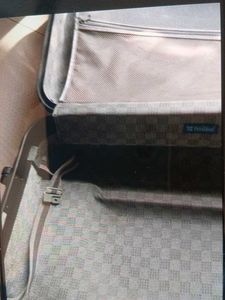 Black suitcase for tourism