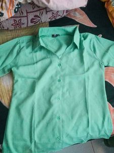 Green button-down blouse