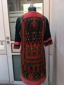 A colorful knee-length kurta