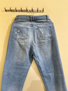 Ripped Light Wash Denim Jeans