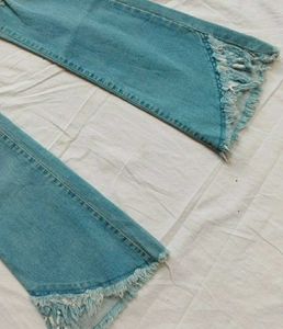 Ripped Fringe Hem Flare Jeans