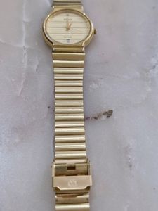 Original TITAN WATCH GOLD plated.