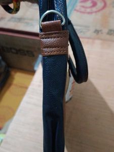Brown and Navy Leather Travel Bag