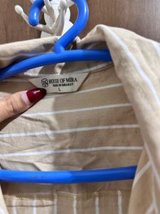 striped light creme shirt.