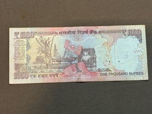 1000 Rs Signed By D Subbarao Middle 786