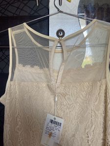 Brand new beige lace dress with pearls