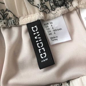 H&amp;M Skull Print High Low Skirt
