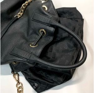 Authentic Michaelkors pure leather drawstring bag.