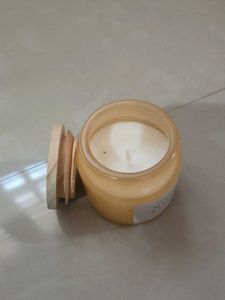Unused Mesmerizing  mango peach scented candle