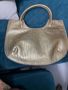 Golden party wear handbag