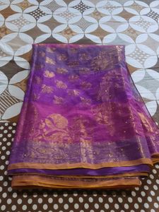 Elegant Purple zari and  stone work saree