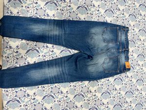 Ripped High-Waisted Jeans