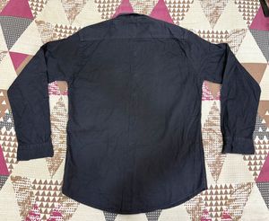 Combo of black shirt and blue straightfit jeans