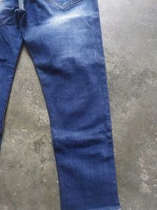 Ripped Blue Denim Jeans