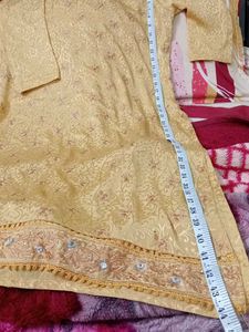 Elegant golden colour Indian suit