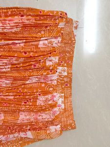 Pleated Orange Skirt