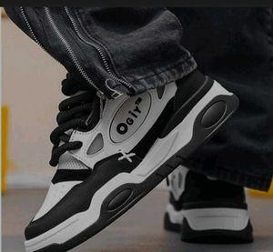 Stylish Black & White ogiy sneakers
