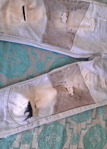 Distressed Patchwork Denim Jeans