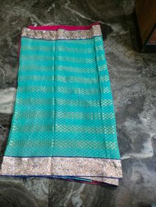 Red &amp;firoja colour saree.