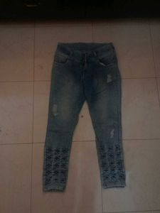 Distressed Denim Jeans with Cutout Detail