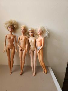 Extremely Used &amp; Damaged Barbies