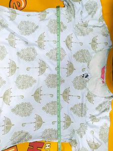 Front Knot Short Kurti Top With 3/4 Sleeves.