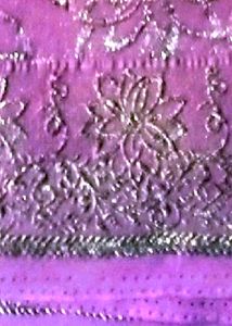 A Purple Colour Saree With Blouse