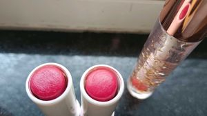 2 nivea cherry lipbalm and 1 glitter lip gloss