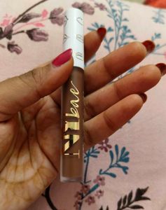 NY Bae Lip Gloss in brown dates shade