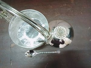 D MART SILVER PLATED SHOWPIECE WITH BOX