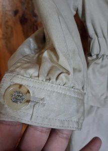Ruffled Beige Trench Coat