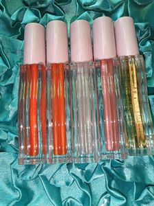 Combo Of Gisou Lip Gloss With So Many Free Gifts.