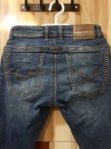 Ripped Blue Denim Jeans