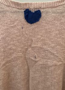 peach pullover