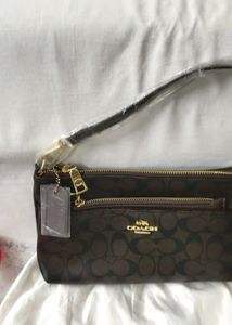 🎀👛A COACH INSPIRED SLING BAG WITH 2BELTS,1 POUCH
