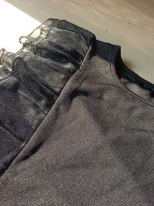 Elegant Black Top with Ruffle Sleeves