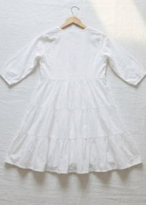 White Embroidered short kurti ( unused )