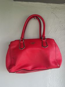 guess hand bag in red colour