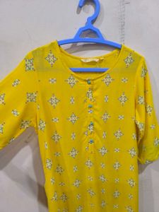 Yellow A-line Kurti.