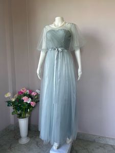 Soft tulle dusty blue gown