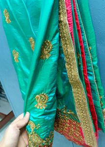 Elegant Turquoise Embroidered Saree