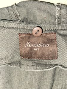 A Green Jacket For Both Girls And Boys