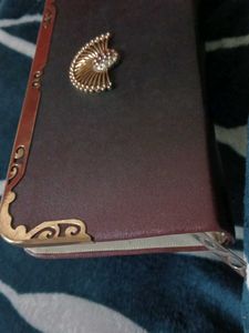 Elegant Clutch with Ornate Details