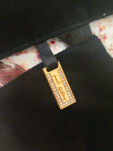 Short Nosepiece With Locket