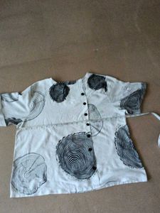 White Breezy top But one Sleeves Has flaws