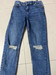 Ripped Knee Denim Jeans