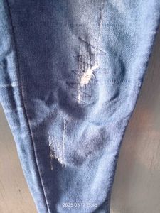 Distressed Denim Jeans